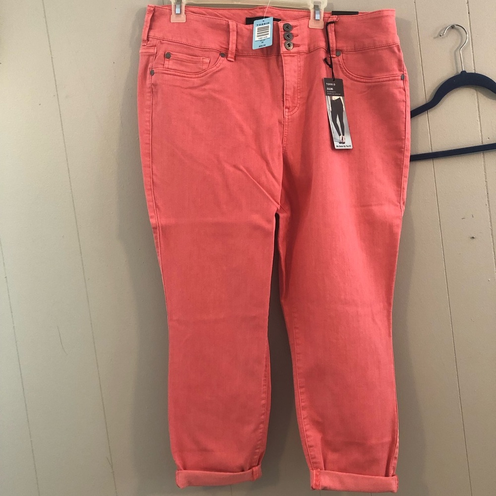Size 20, coral colored jeggings from Torrid, new with tags